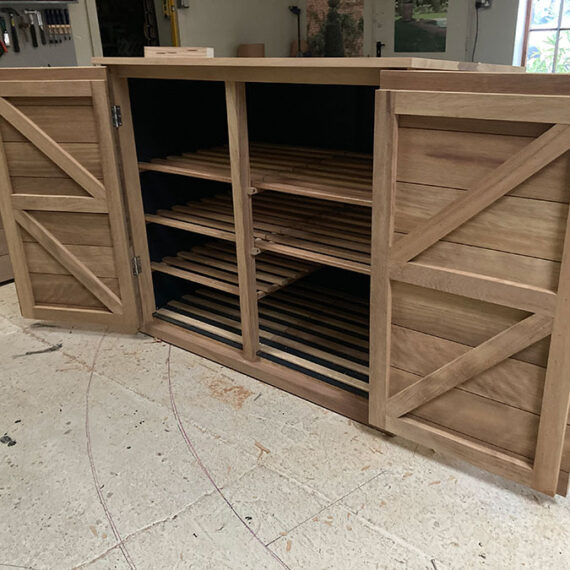 bespoke hardwood garden storage with doors open