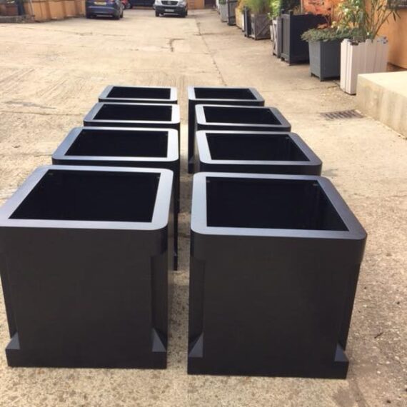 black modern rounded painted hardwood planters