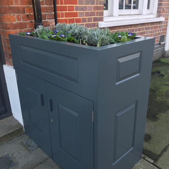 grey painted garden planter with storage