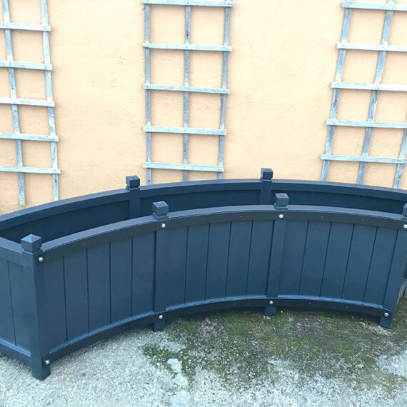 curved painted rounded trough planter