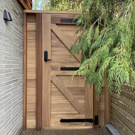 Bespoke luxury timber pedestrian gate made to order from natural hardwood with traditional diagonal bracing.