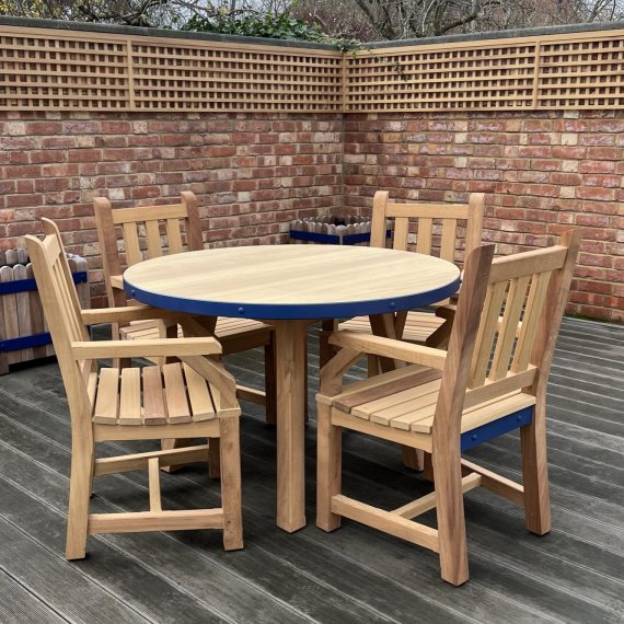 Bespoke carver and round table set with blue detail. Traditionally made to order.