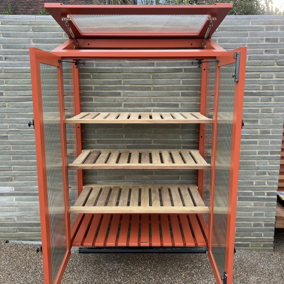 Luxury orange Hardwood coldframe in Accoya and spray coated. Bespoke and made to order.