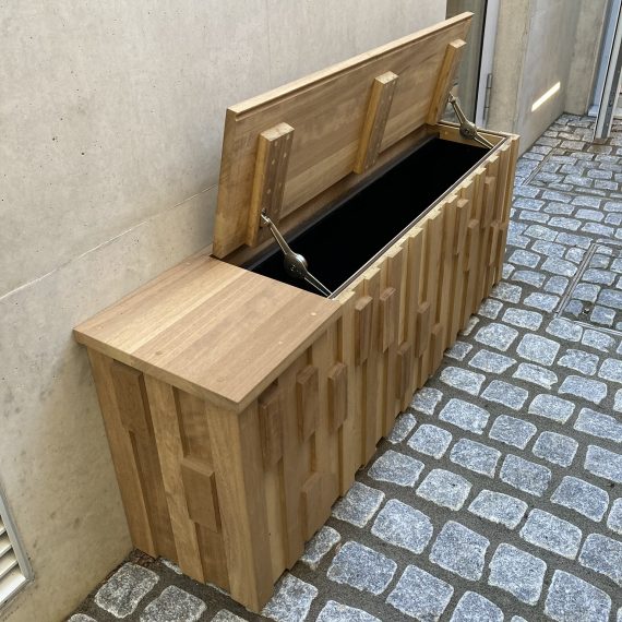 Large outdoor binstore in iroko bespoke made to order with stainless steel hinges