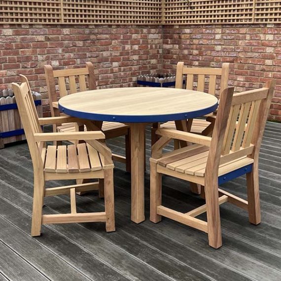 Bespoke carver and round table set with blue detail. Traditionally made to order.