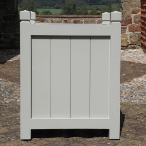 Traditional Hertford wooden garden planter in a pale grey finish, featuring recessed vertical panels and square decorative finials.