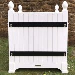 Two-tone black and white Versailles-style planter