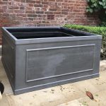 Bespoke extra large English lead-clad garden planter cube, showcasing a classic panel design for luxury estate landscaping.