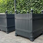 Luxury versailles Accoya planters in London property painted black