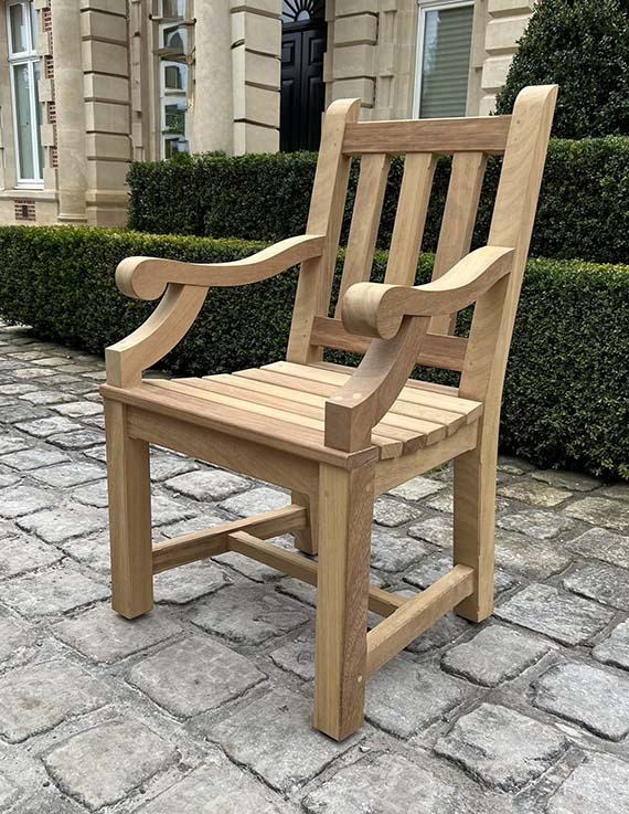 Traditional solid oak outdoor garden carver with armrests made to order, made in the cotswolds. Traditional solid oak outdoor garden carver with armrests made to order, made in the cotswolds.