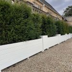 Luxury row of painted Accoya cube planters as a privacy screen.
