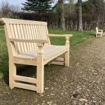Bespoke English oak timber garden bench with slatted back and heritage joinery.