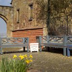 Estate Painted Copper Detail Garden Bench Bespoke blue painted outdoor bench set with decorative copper detailing and cross-lattice backrest.